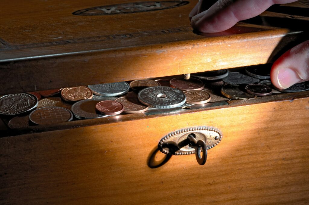 Coins with a lock in a box