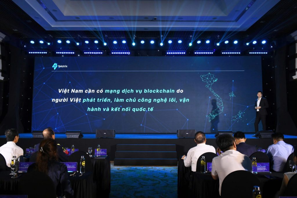Phan Duc Trung speaking to government officials and industry professionals at the launch of 1Matrix.